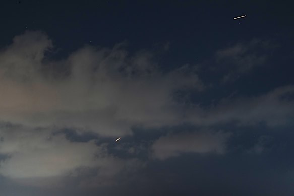 The Israeli air defence system fires to intercept missiles launched from Iran on Sunday.