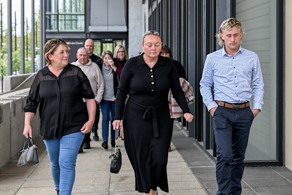 Hannah McGuire’s mother Debbie (centre) outside court.