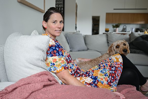 Medical researcher Adrienne O’Neil, pictured here with her dog Daisy, lived with chronic fatigue for a decade before receiving a diagnosis.