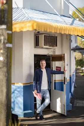 James Laskie outside his cafe on Thursday.