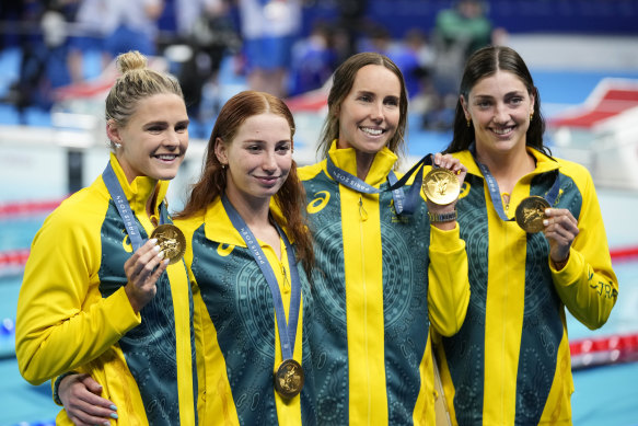 Australia’s Shayna Jack, Mollie O’Callaghan, Emma McKeon and Meg Harris, from left, celebrate after winning the women’s 4x100-metre freestyle relay final in Paris. 
