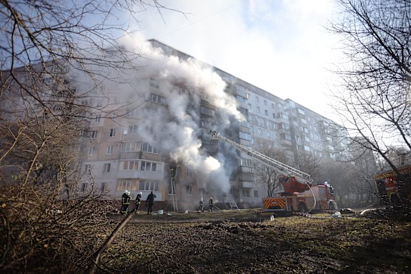 Smoke rises in the aftermath of Russian strikes on a building in Ternopil on November 19.