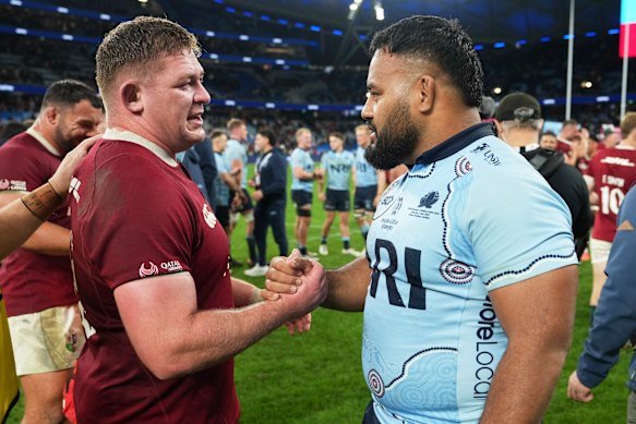 Taniela Tupou shakes hands with Tadgh Furlong of the British and Irish Lions