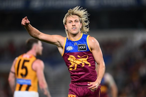 Lohmann celebrates kicking one of his goals against Hawthorn.