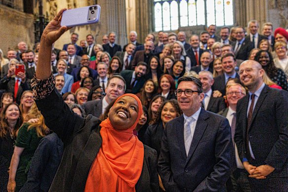 UK Labour’s Newest MP, Sagal Abdi-Wali, takes a selfie with Prime Minister Andy Burnham and other colleagues at Westminster Hall on Monday.