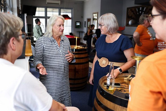 Burge meets Milthorpe at a meet-and-greet, as she contemplates how to vote at the upcoming byelection.