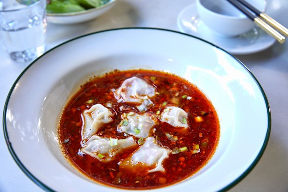 Grape Garden’s san xian dumplings in Sichuan chilli oil.