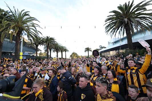 Hawthorn fans make the Hawk Walk to the MCG for tonight’s game.