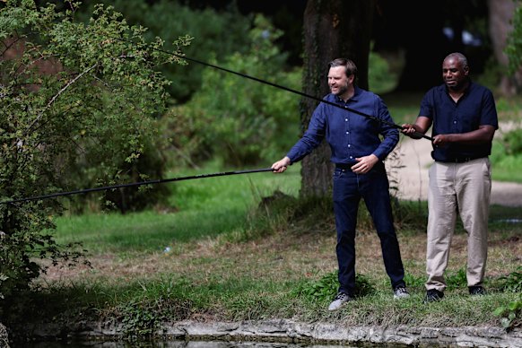 Lammy and Vance fish in a lake in the grounds of Chevening House.