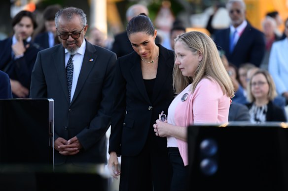 Amy Neville, right, with World Health Organisation director Tedros Adhanom Ghebreyesus and Meghan, the Duchess of Sussex, earlier this year.