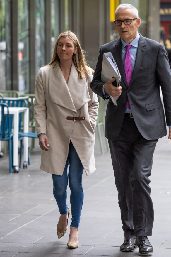 Kah at the Victorian Racing Tribunal in September with her lawyer, Matthew Stirling, to defend her riding charges.