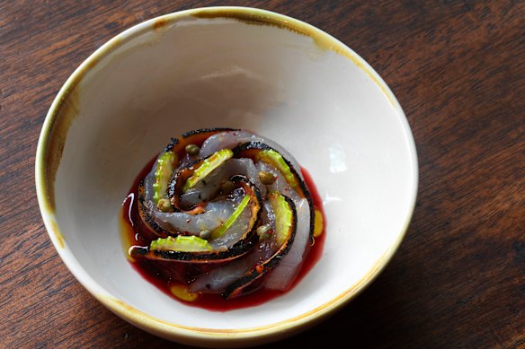Coral trout crudo, burnt blood orange and capers.