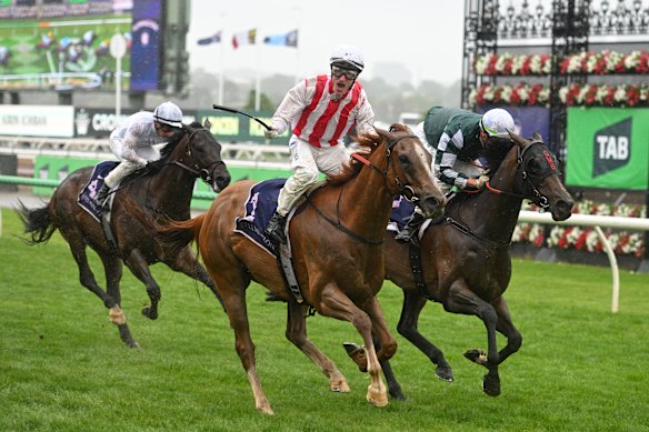Mark Zahra on board Giga Kick wins the Champions Sprint.