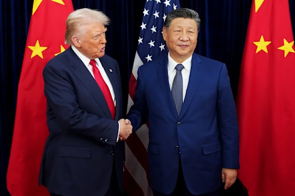 US President Donald Trump greets Chinese President Xi Jinping ahead of their meeting.