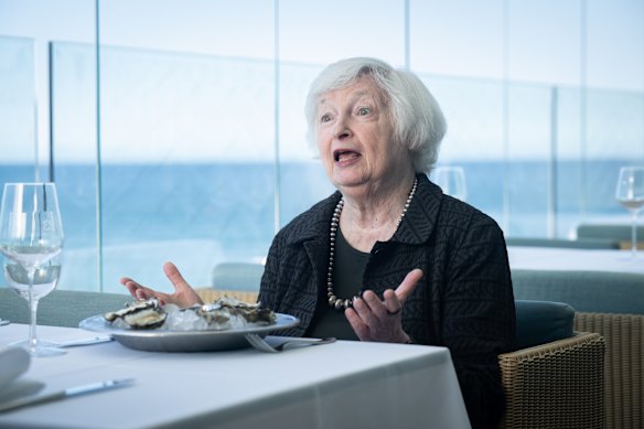 Former Fed chair and treasury secretary Janet Yellen - pictured at Bondi Icebergs - co-signed a statement criticising the move against Powell.