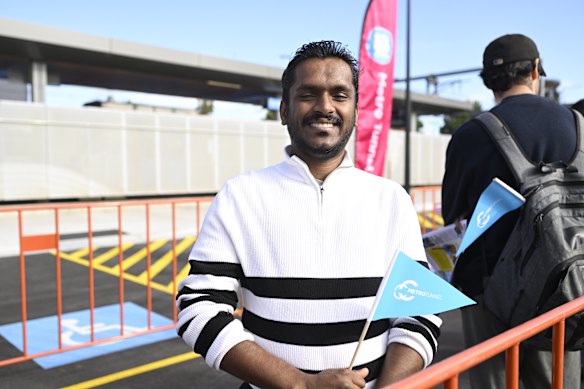Train enthusiast Sisila Priyankara lines up at Sunbury train station.