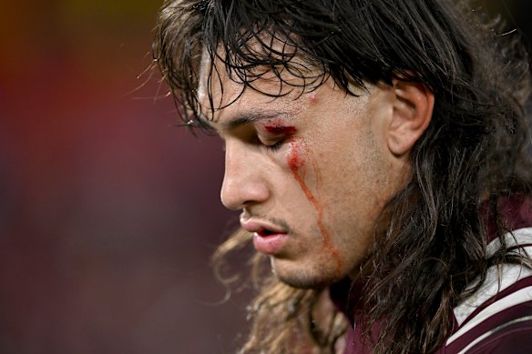 Tino Fa’asuamaleaui cuts a dejected figure after the Maroons’ game one defeat.