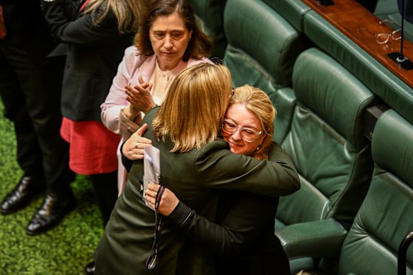 Premier Jacinta Allan (left) and Treaty Minister Natalie Hutchins embrace after the apology.