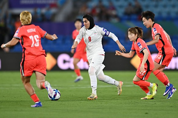 Iranian captain Zahra Ghanbari in action during the 3-0 defeat by South Korea.