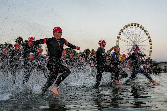 Competitors in the Male Pro Series enter the water during the IRONMAN 70.3 Geelong on March 22, 2026 in Geelong, Australia. 