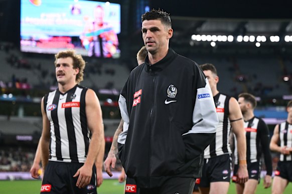 Scott Pendlebury walks from the ground with his Collingwood playing future in doubt.