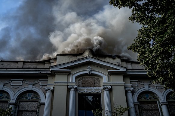 Smoke rises from the House of Culture in Kharkiv after a Russian drone attack.