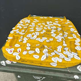 Stickers that must be peeled off Alibarbar vapes have become a common sight outside illicit tobacco stores.