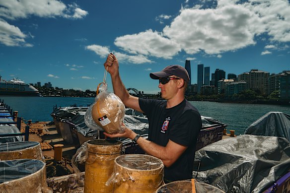 Fireworks are loaded onto barges ahead of Sydney New Year’s Eve celebrations on Glebe Island earlier this week.