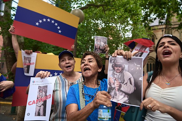 Supporters of the Venezuelan opposition celebrate following the fall of President Nicolás Maduro in Sydney on Sunday.
