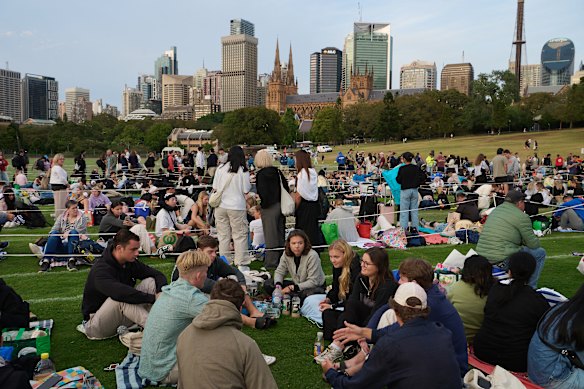 Revellers queue outside the Domain in Sydney’s CBD to get to the best vantage points for New Year’s Eve fireworks.