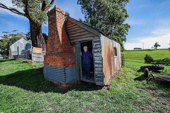 Elizabeth Toomey at one of the Heritage Victoria spud huts in the Trentham district.
