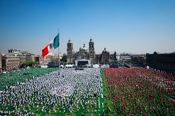 A massive soccer class that broke the Guinness World Record as the Largest Soccer Class in the World with the participation of 9,500 people at Zocalo in Mexico City.