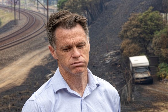Premier Chris Minns visits areas affected by the Koolewong bushfire on Sunday.