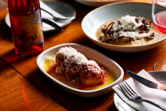 Meatballs served with melting parmigiano toupees and a rich glug of Napoletana.