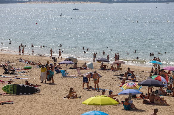 Beachgoers cool off at Saint-Jean-de-Luz in south-west France.