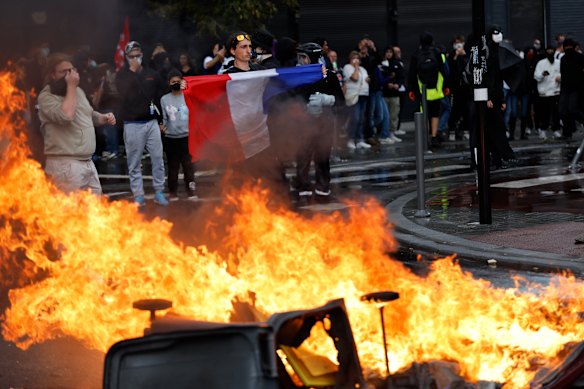 Protesters set fires as they blocked highways across France early Wednesday after the government collapsed over proposed budget cuts.
