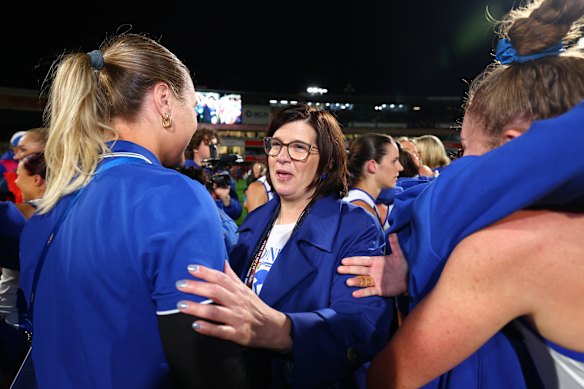 North Melbourne president, Dr Sonja Hood celebrates with North’s AFLW premiership players.