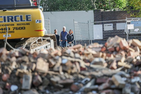 Residents of Florence Street Nadine Parkington, Hugh Hardy, and Kathleen Munson.  Residents support an expansion of community housing but fear plans for a six-story building are too big.