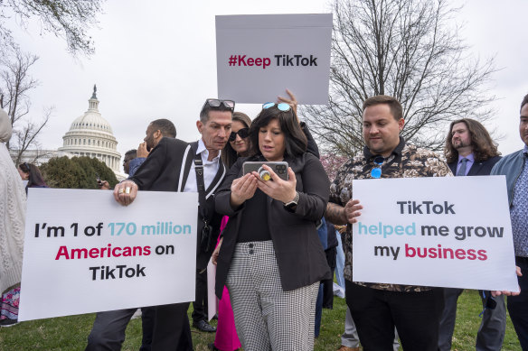 TikTok supporters and users  at a March 2024 protest against the US banning the platform.