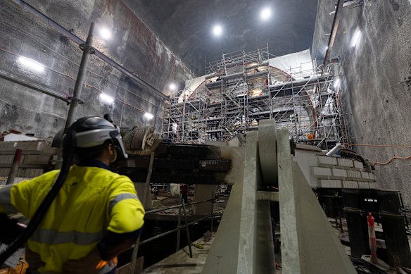 A worker near the front of the boring machine named  Patyegarang, which is expected to start tunnelling under Sydney Harbour by the middle of the year.