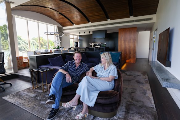 Garry and Kerry Connell are smiling after not bowing to pressure to sell their penthouse for less.