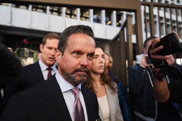 Alan Jackson leaves court after stepping down from the case.