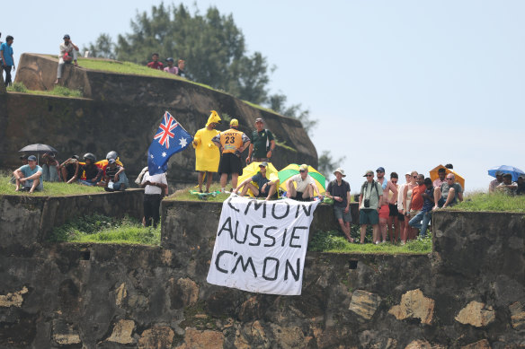Australian spectators watch the first Test from the ramparts of the Galle fort.