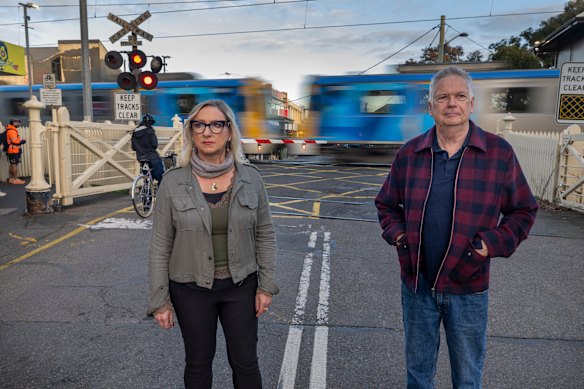 Yarraville locals are divided on plans to remove a level crossing. Robert Price and Louise Beach fear it will transform the suburb for the worse.