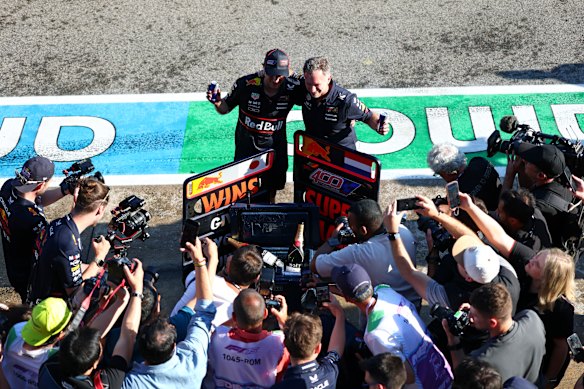 Max Verstappen (left) and Horner celebrate the win at Imola in May.