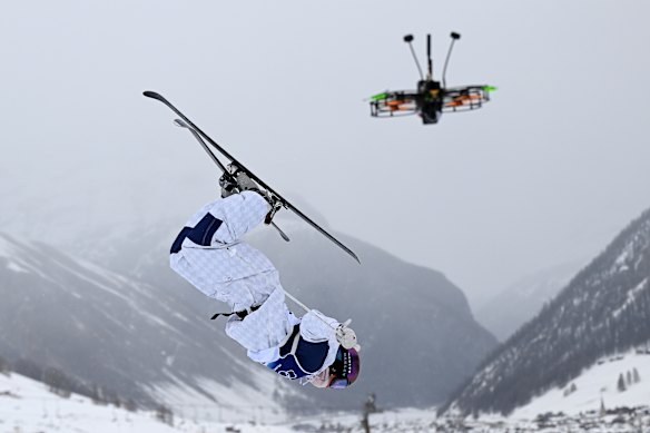 Makayla Gerken’s mogul run is watched by a drone.
