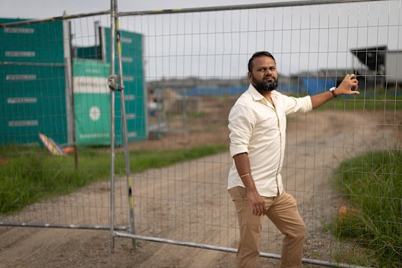 Aravind Vijay stands outside the temporary public school in Box Hill.