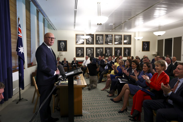Peter Dutton gets a round of applause at a Coalition party room meeting last year.