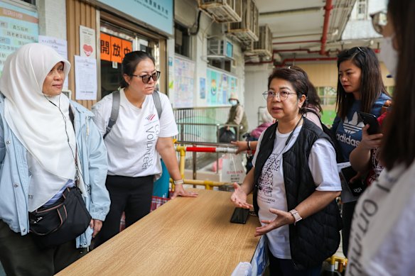 Bethune House executive director Edwina Antonio, second from the right, is assisting South-East Asian workers affected by the deadly Tai Po fire.