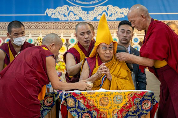 The Dalai Lama presides over an event celebrating his 90th birthday at the Tsuglakhang temple in Dharamshala on Monday.